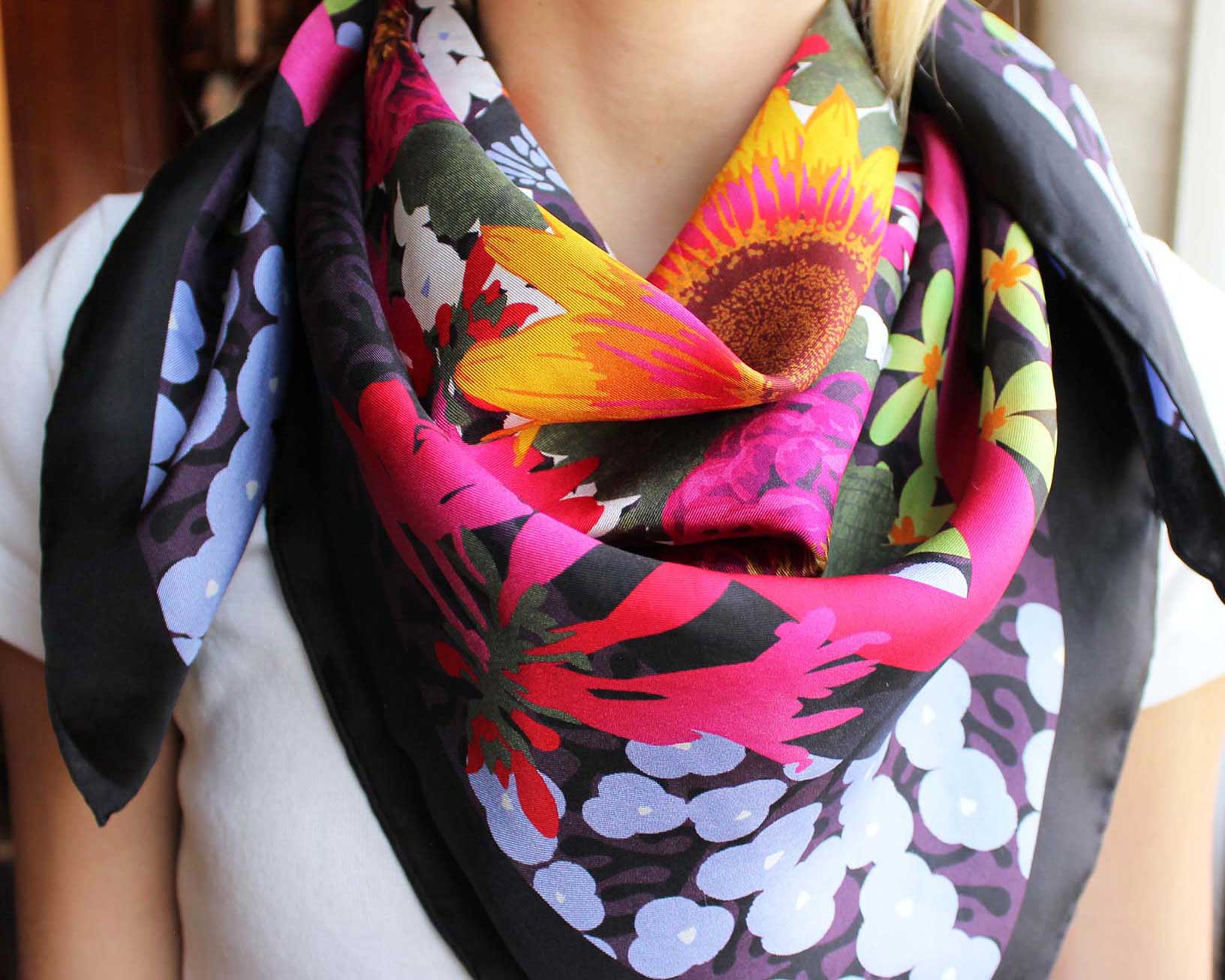 Woman wearing colorful scarf around her neck