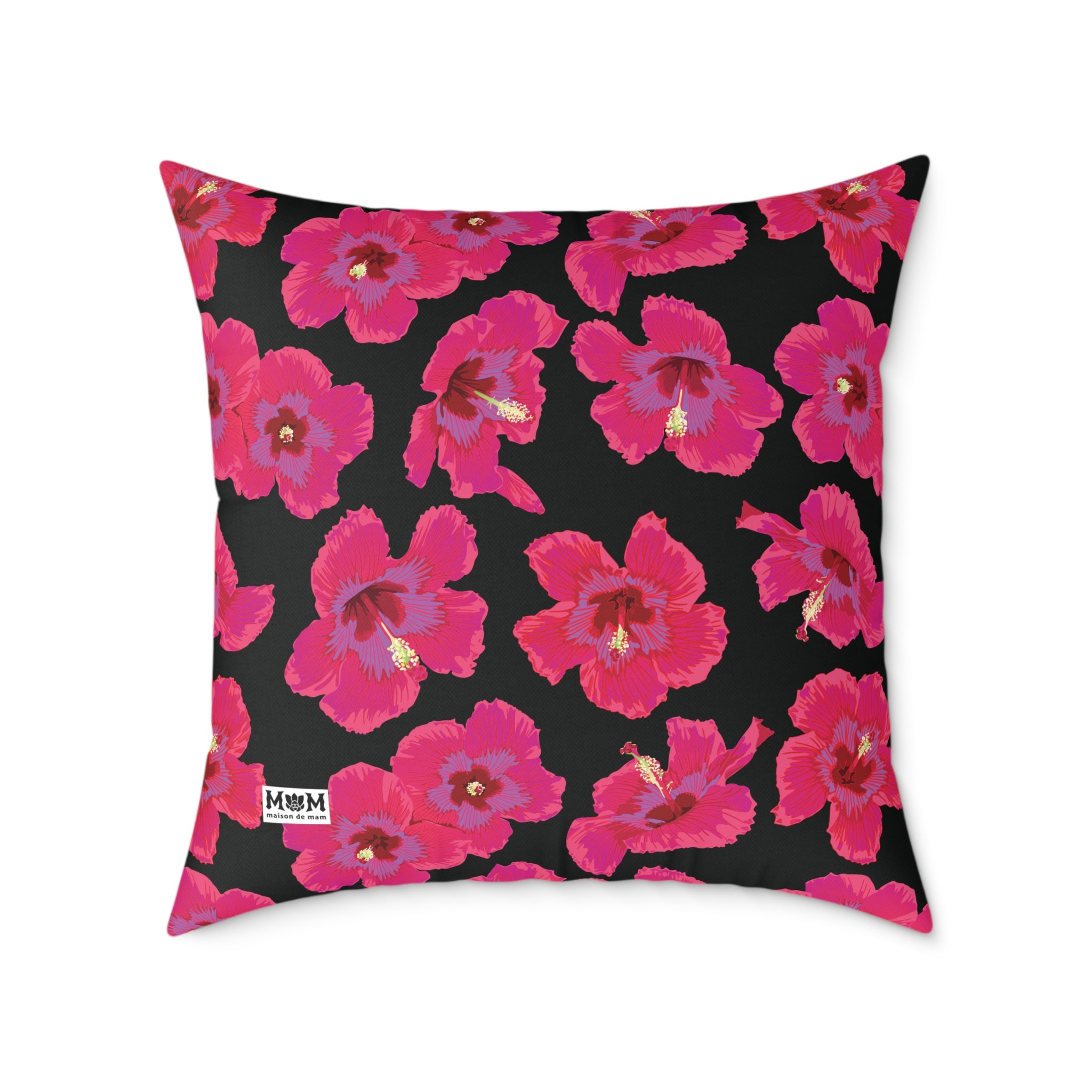 Decorative pillow with pink floral pattern on a black background